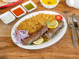 Beef Kofta kabobs over rice
