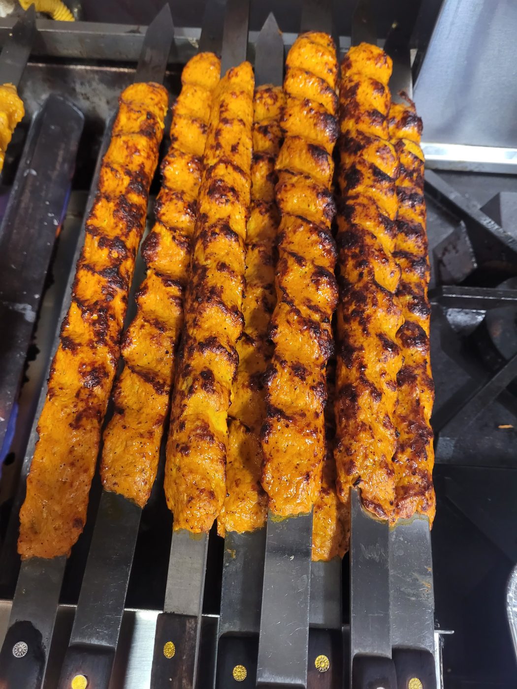 Chicken kabab skewers on the grill